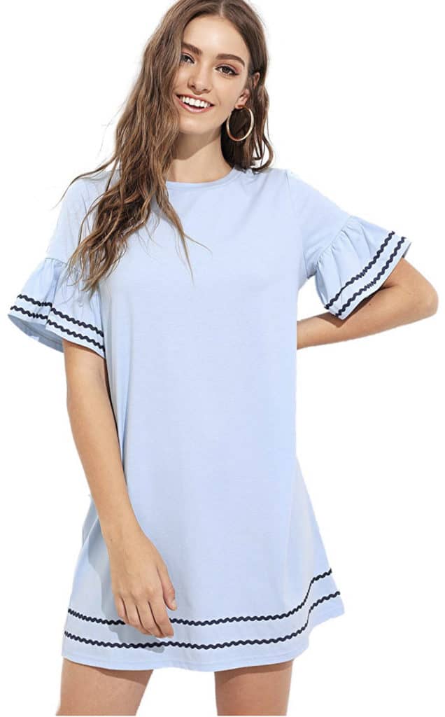 Photo of a model wearing an above-the-knee length light blue dress with ruffle sleeves, accented with navy blue stripes.