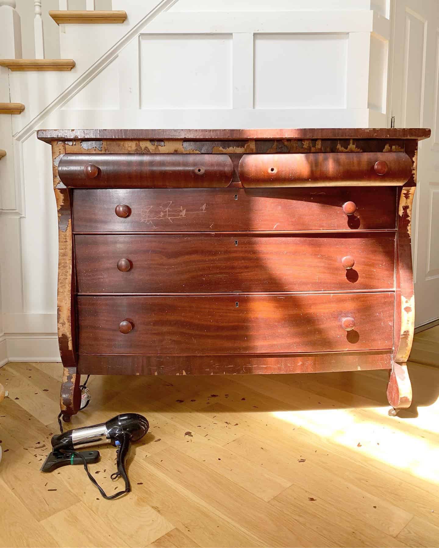 Removing veneer and refinishing old furniture, with several methods to get a raw wood finish.
