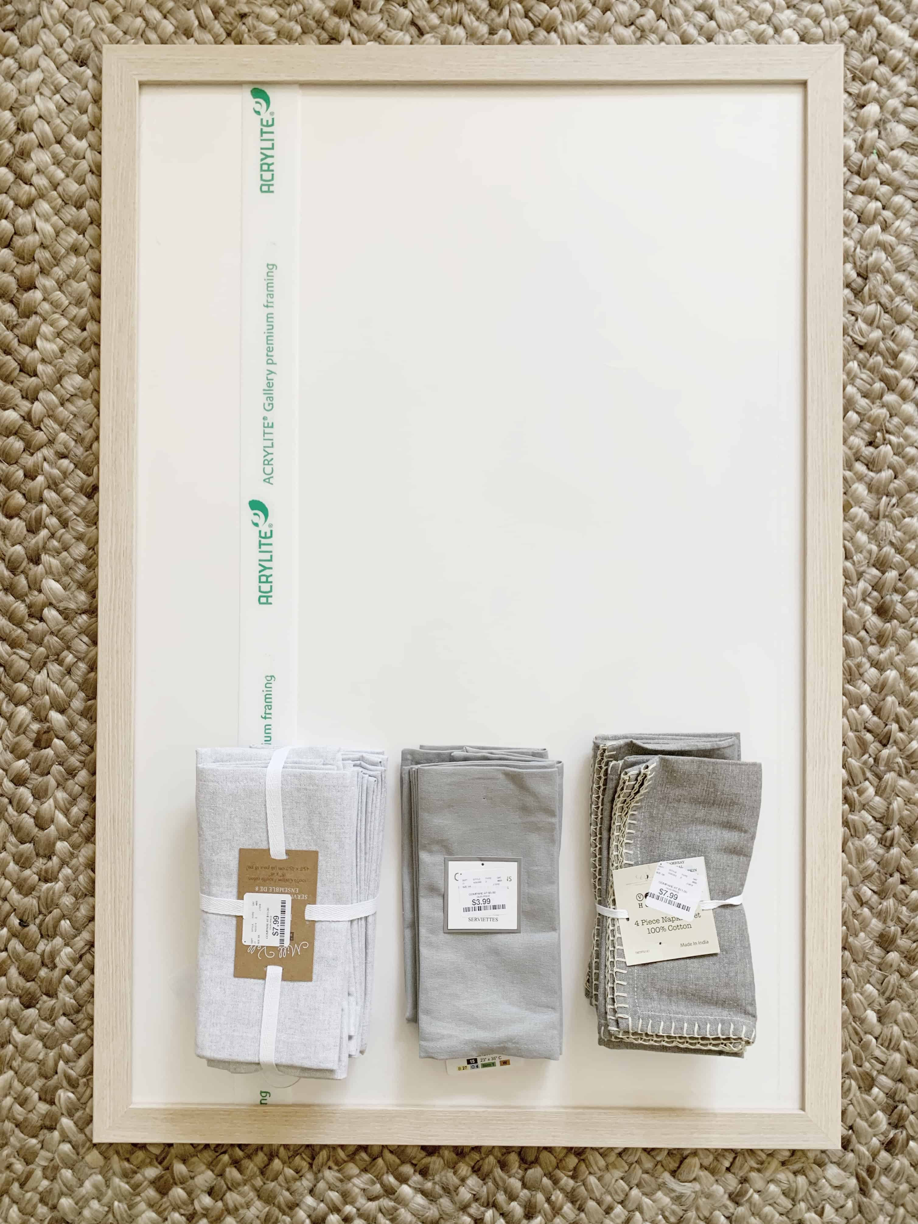 Make your own textile by framing linen napkins using this quick and easy tutorial. Choose a frame and glue the napkin to the foamcore, creating your own art in minutes. #textileart #diyart #framedart #art