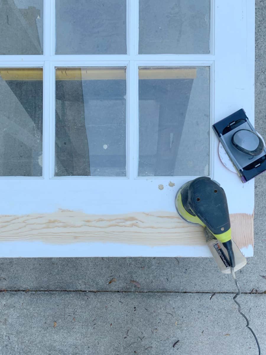 Sanding down the paint on the old wood and glass pocket doors we plan on installing in our home office. #office #kidsdesks #coastaldeco #coastalhome #builtins #builtindesks