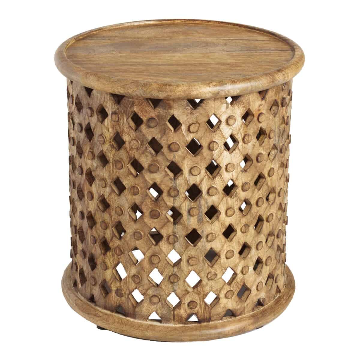 Round Lattice Carved Wood Accent Table from World Market is a great accent piece for indoor or outdoor use, as a coffee side table or unique bedside table.