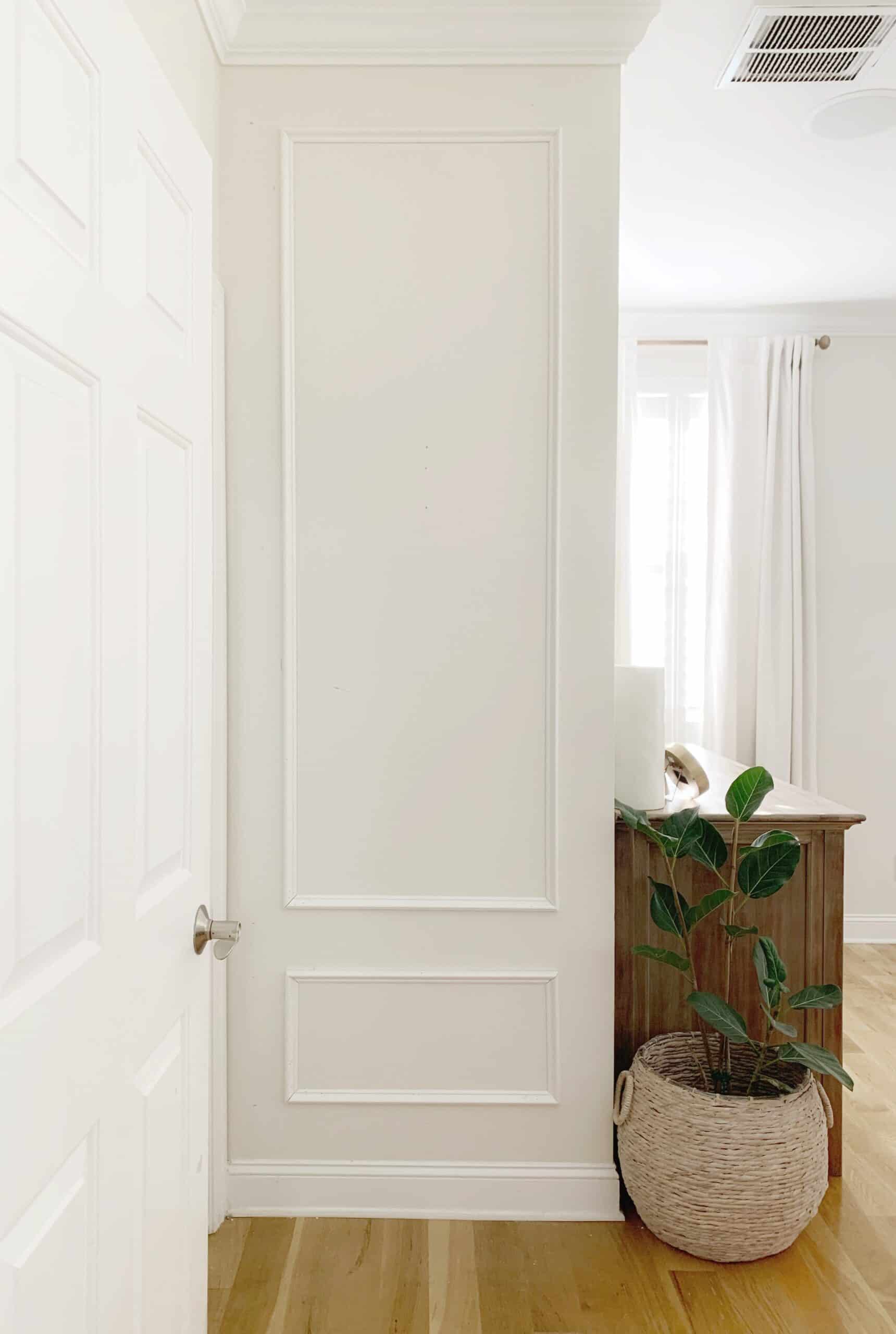 How to install picture frame molding, the easy way, using miter shears and PVC molding. No saw required. #millwork #molding #moulding #pictureframemolding #pictureframemoulding #pvctrim #pvcmillwork #walltrim #walltreatment