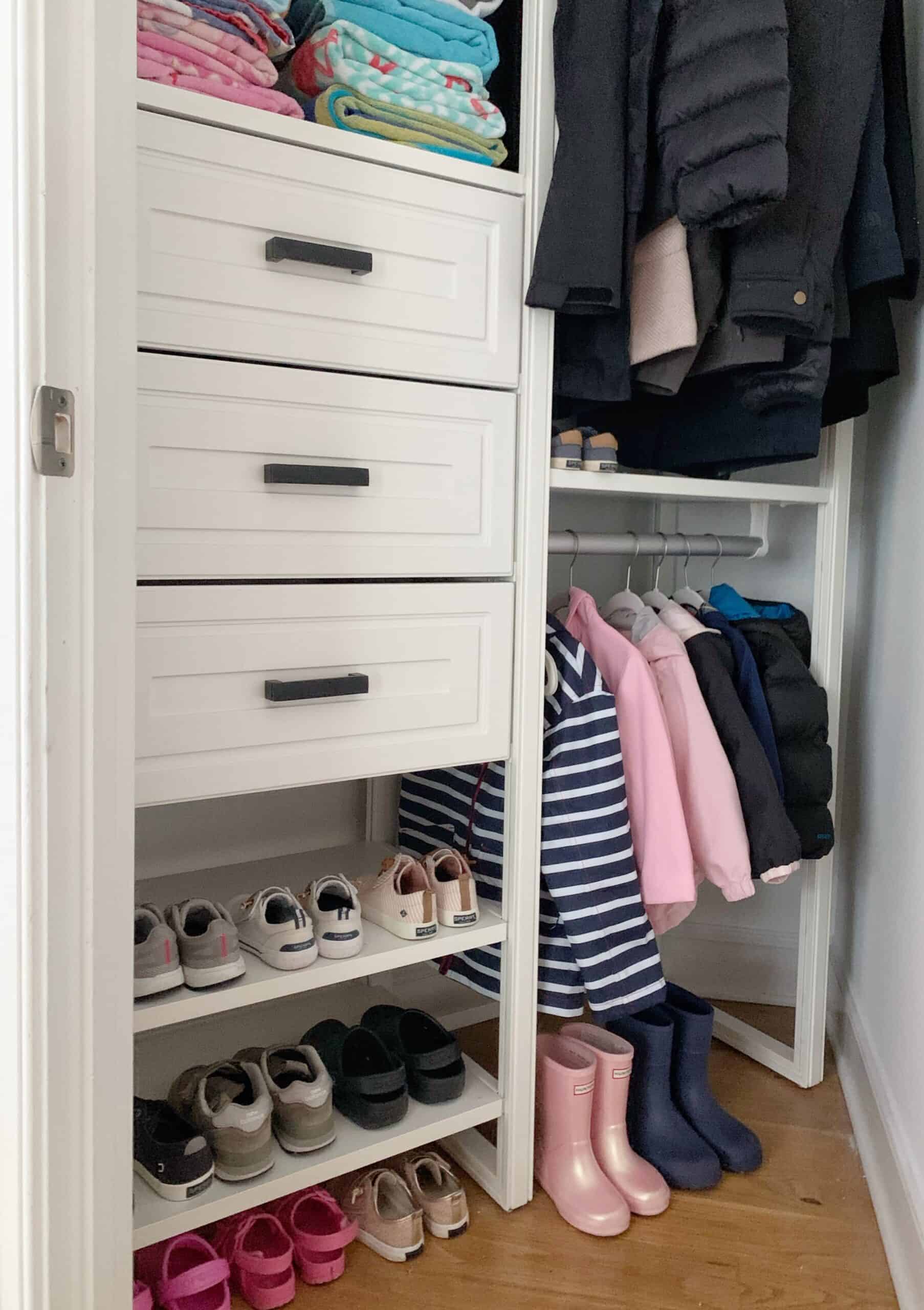 A look into our all seasons closet, which gives us ample room to store the kid's winter jackets, snow boots, and various pairs of shoes.