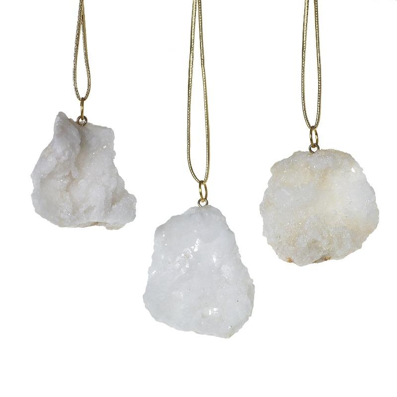 Three unique gemstone ornaments.