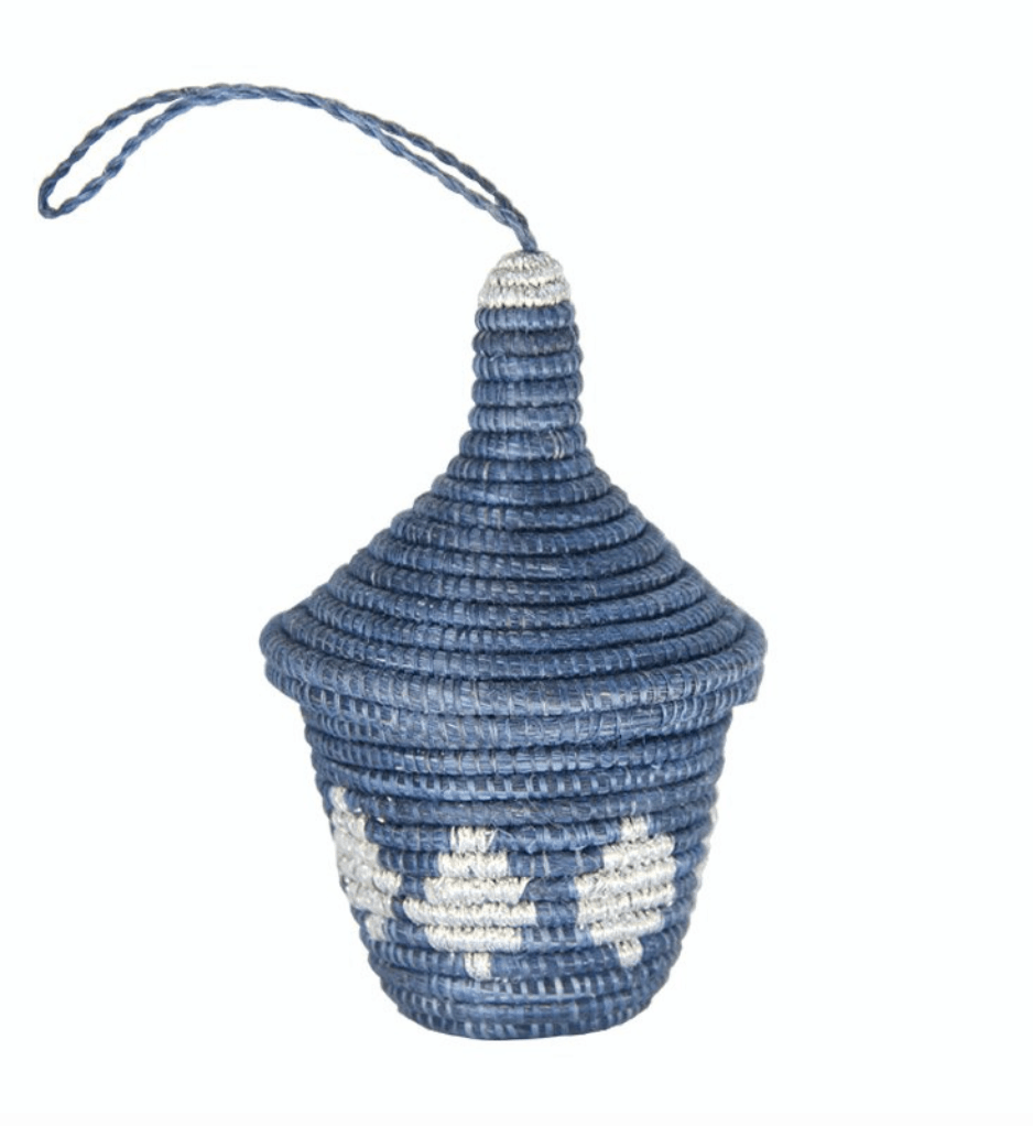 A blue and white woven lidded basket ornament.