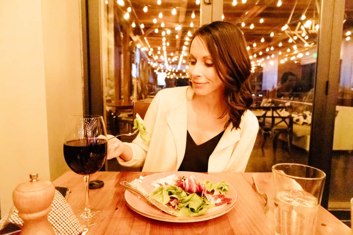Enjoying a starter salad and a glass of wine at Edison Craft Ale and Kitchen Restaurant. #groveparkinn #nationalgingerbreadcompetition #gingerbread #giantgingerbreakhouse #asheville #northcarolina #visitasheville #ashevillehotels #ashevilleresort #mountainvacation