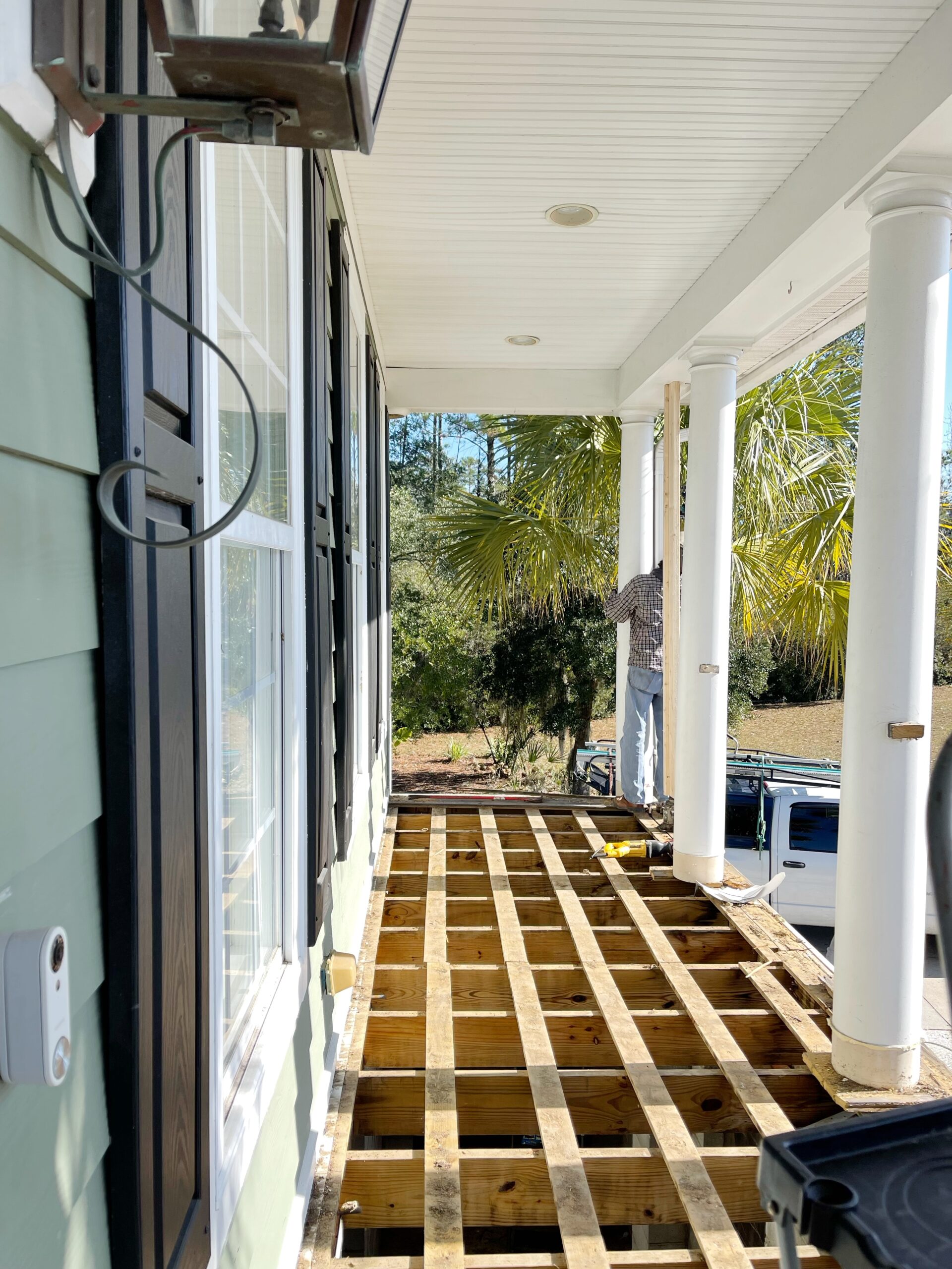 Front porch removal and demo with removing rotten wood boards.
