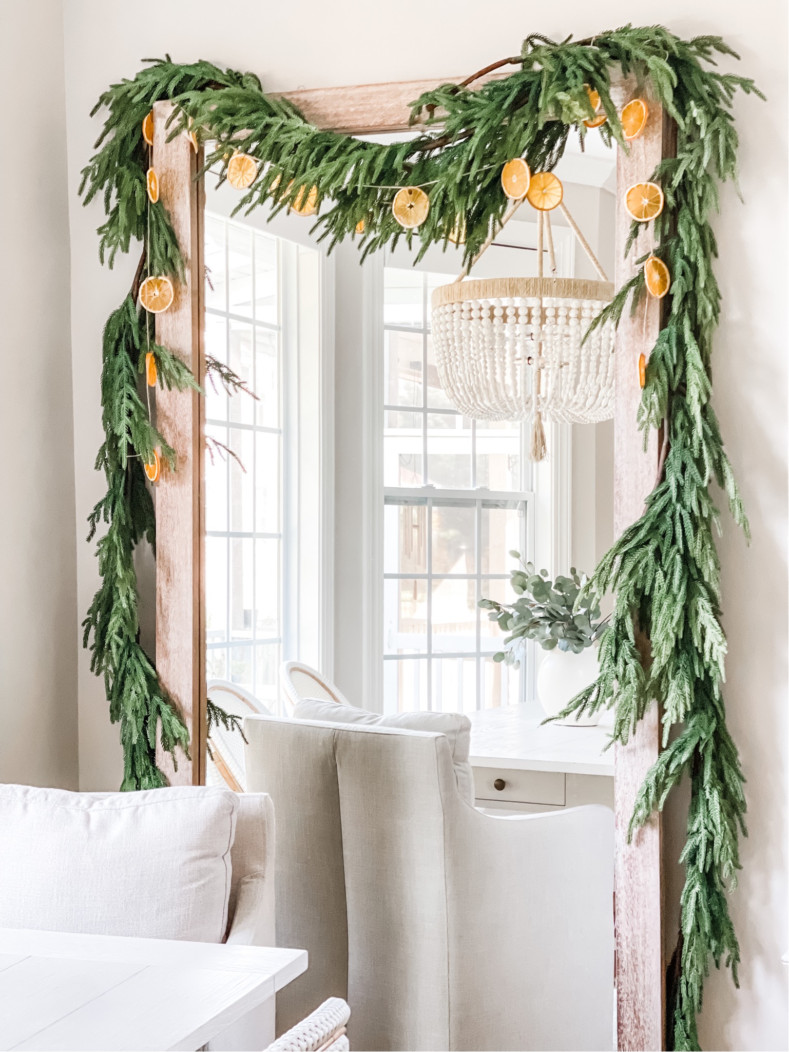 Orange slice garland with real-touch Norfolk pine garland.