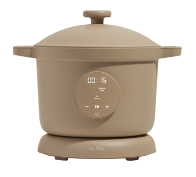 Our Place Dream Cooker in Steam, a modern multi-cooker with a neutral matte finish, offering slow cook, pressure cook, sauté, and rice settings in one appliance.